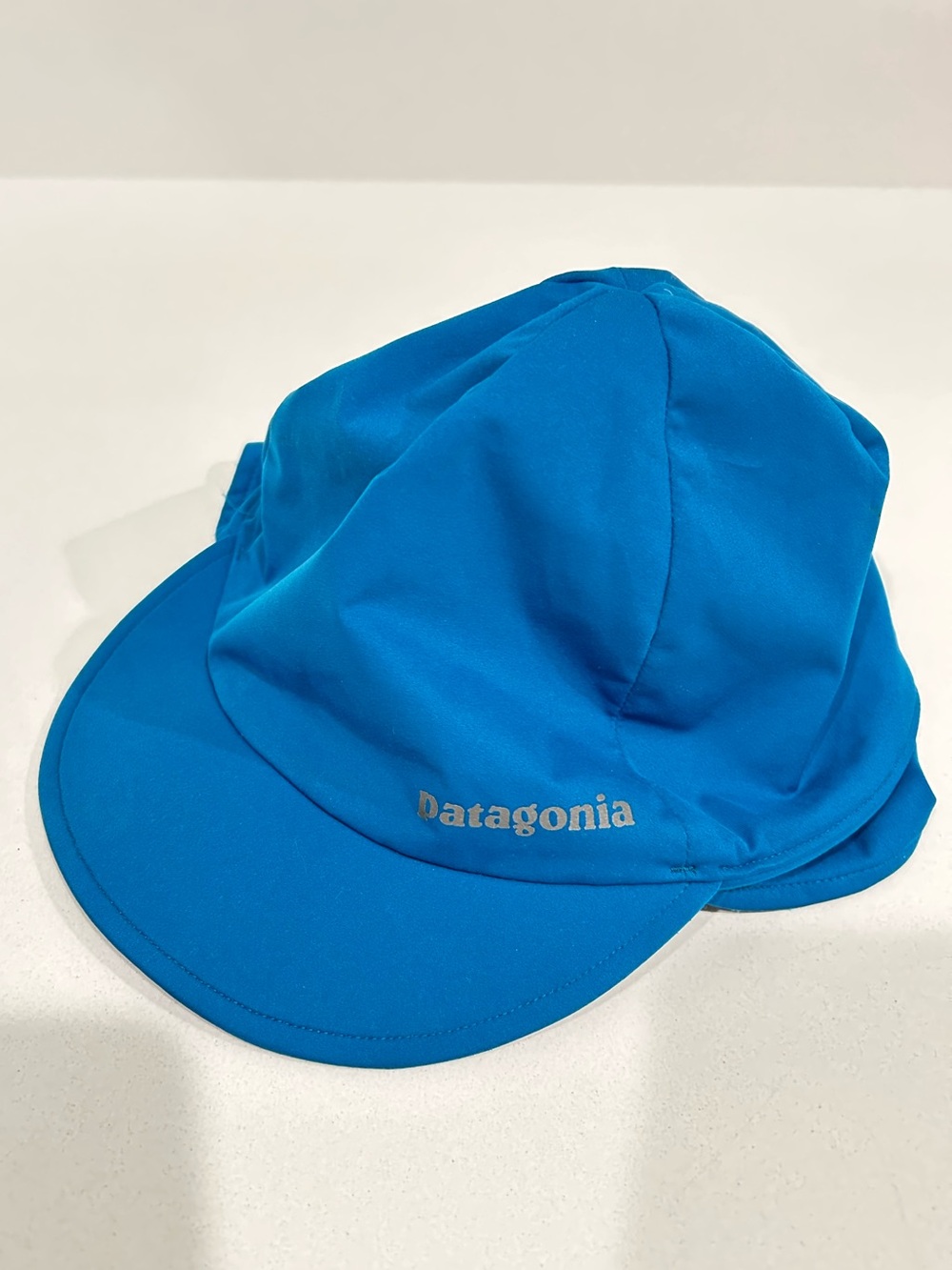 Patagonia Wind Shield Beanie Hat Underwater Blue Brim Ear Flaps 33325 FA15